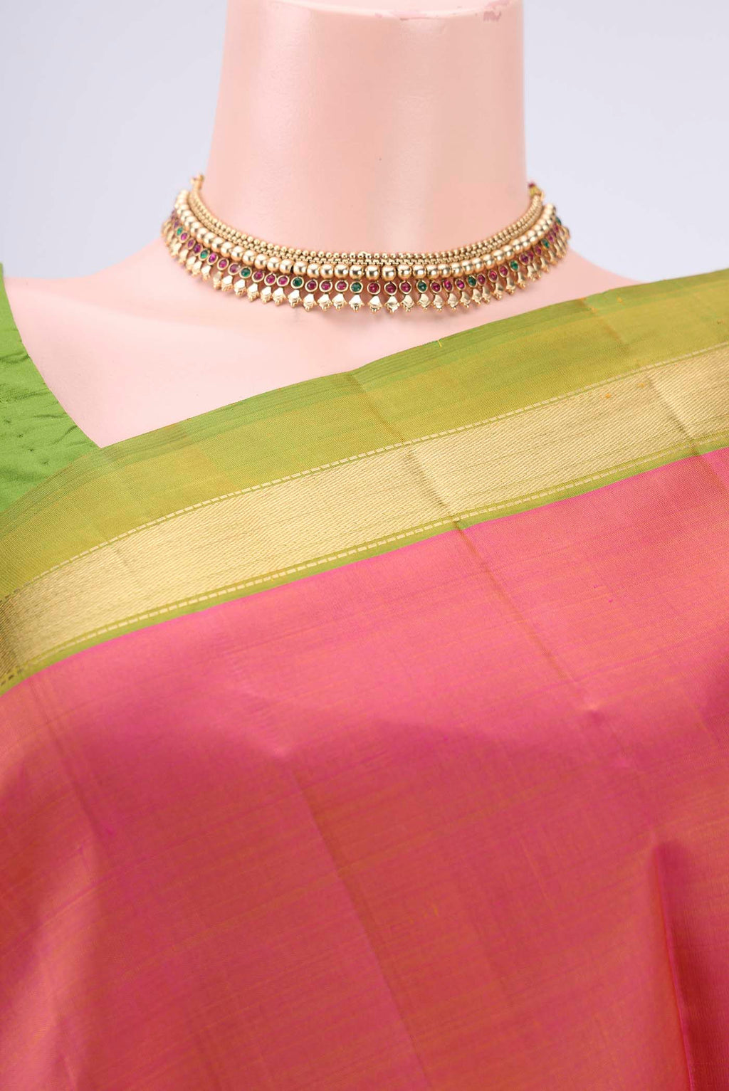 Border image of Brick Orange Dual Tone Kanjivaram Silk Saree with Plain Body and Zari Border. 