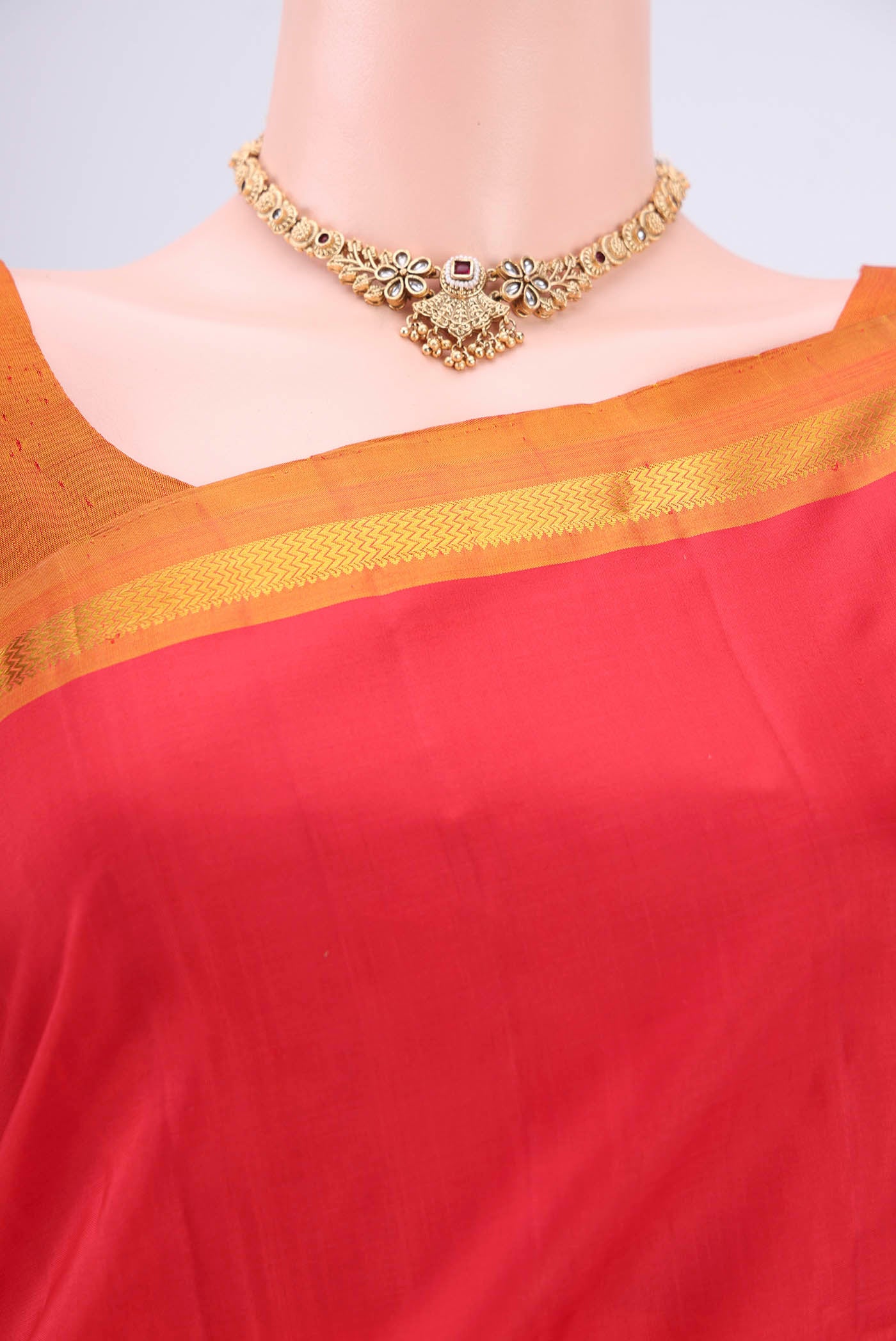 Border image of Red Kanjivaram Silk Saree with Plain Body and Zari Border. 