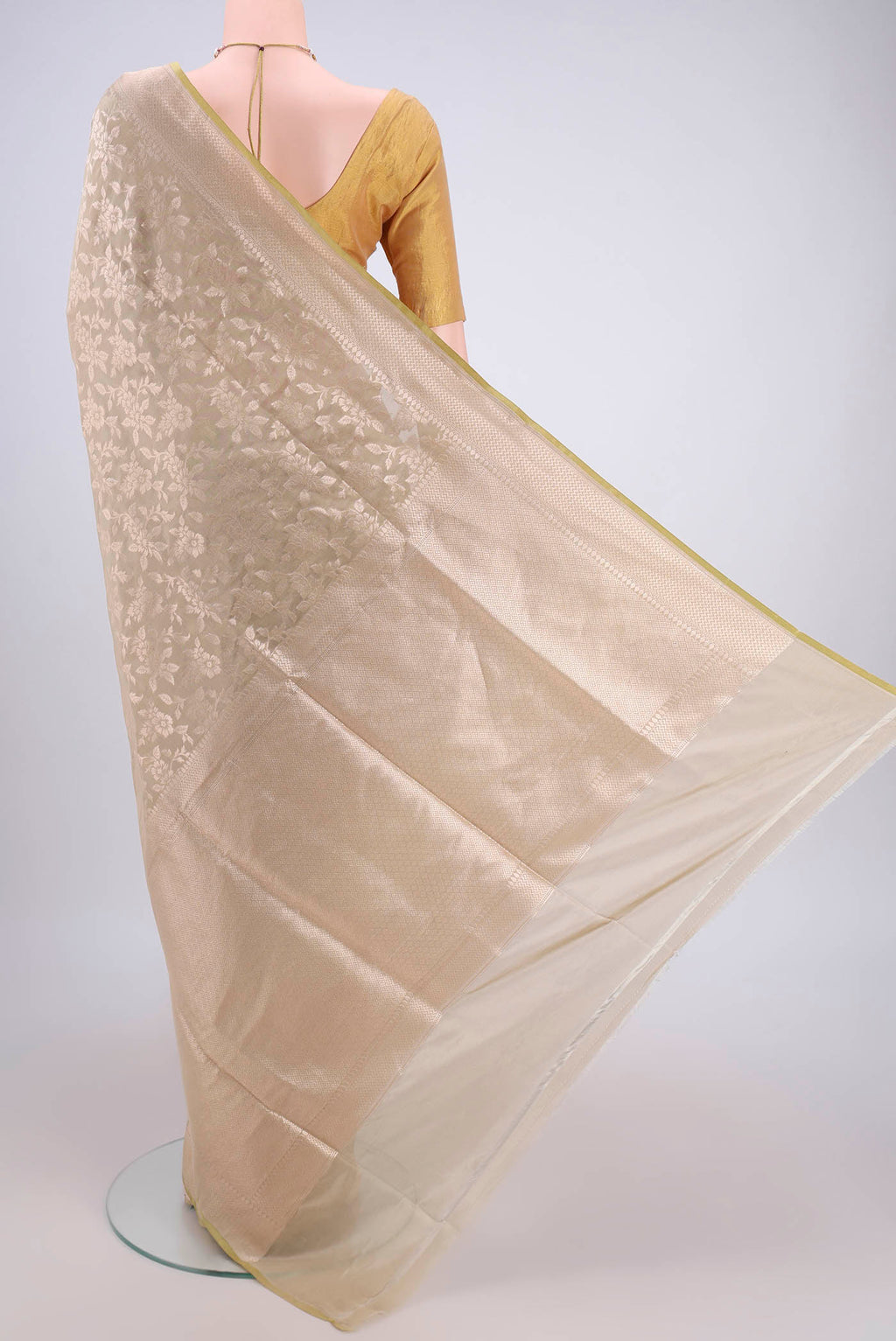 Flat view of Acid Green Banarasi Silk Saree with Zari Brocade on the body and Zari Border. 