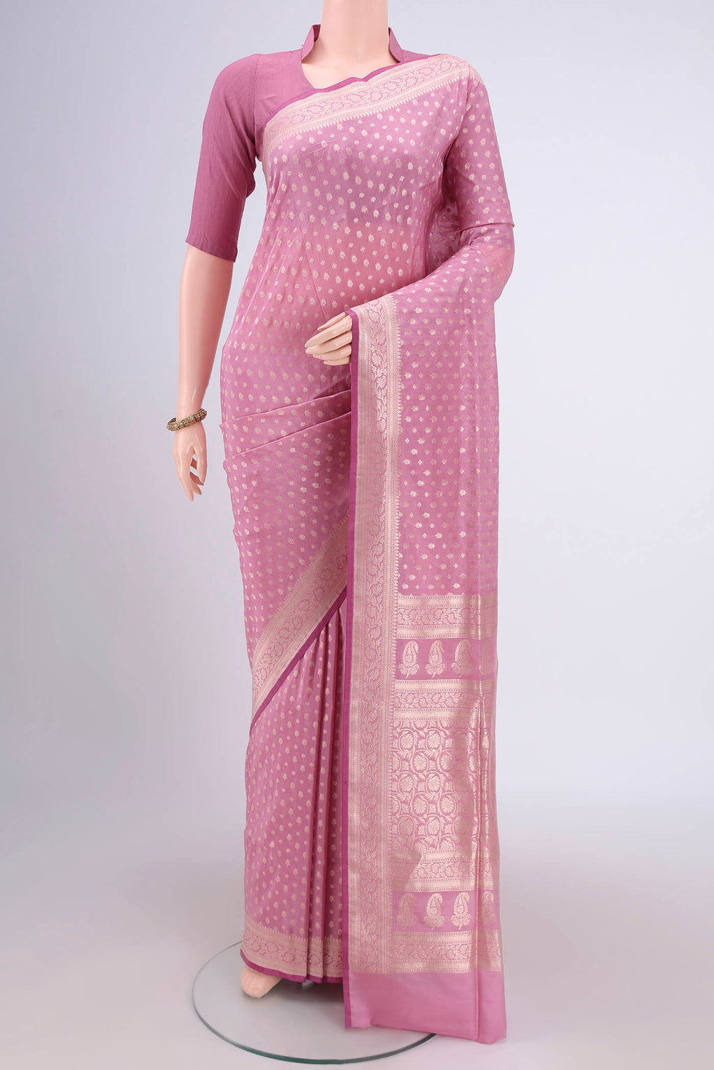 Rose pink Dual Tone Banarasi Silk Saree with Zari Butta on the body and Zari Border.  displayed on a mannequin