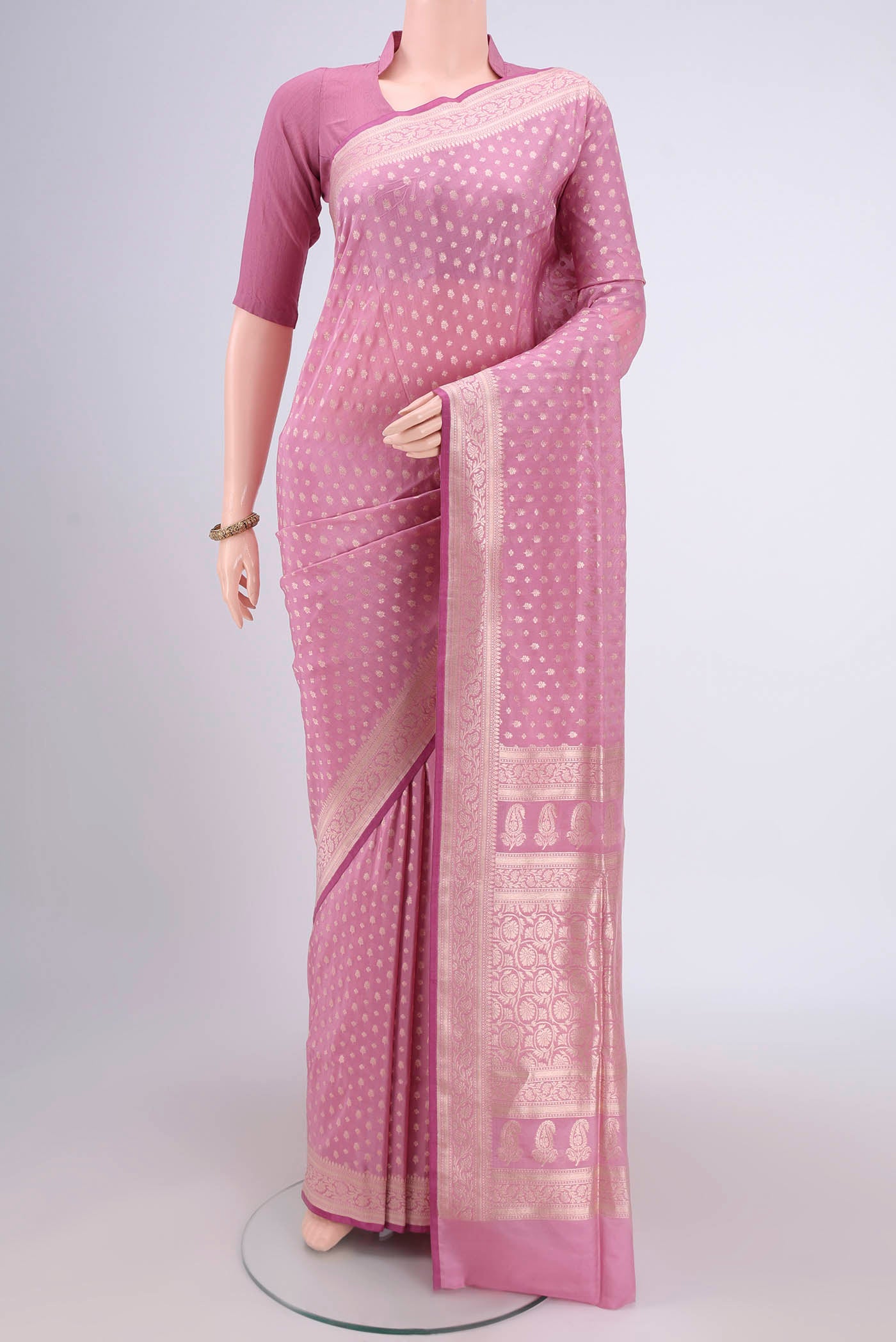 Rose pink Dual Tone Banarasi Silk Saree with Zari Butta on the body and Zari Border.  displayed on a mannequin