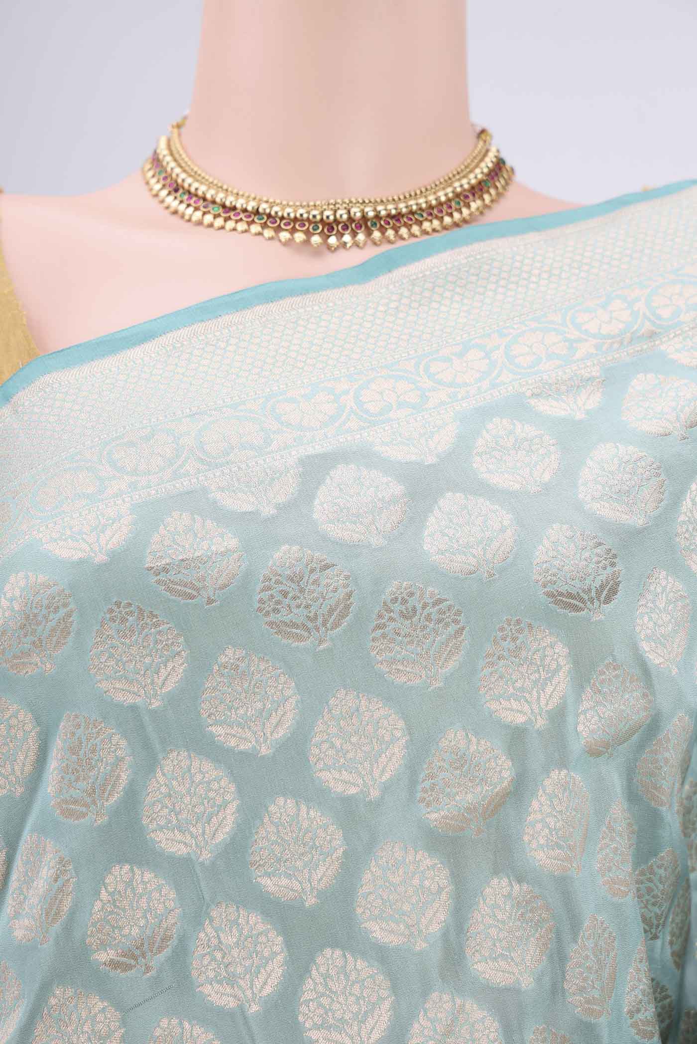 Border image of Sea Green Dual Tone Banarasi Silk Saree with Zari Butta on the body and Zari Border. 