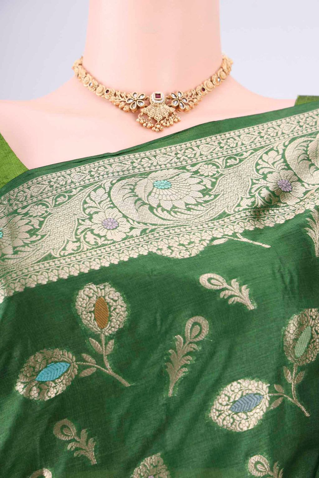 Border image of Green Banarasi Tussar Silk Saree with Zari And Thread Butta on the body and Zari Border. 