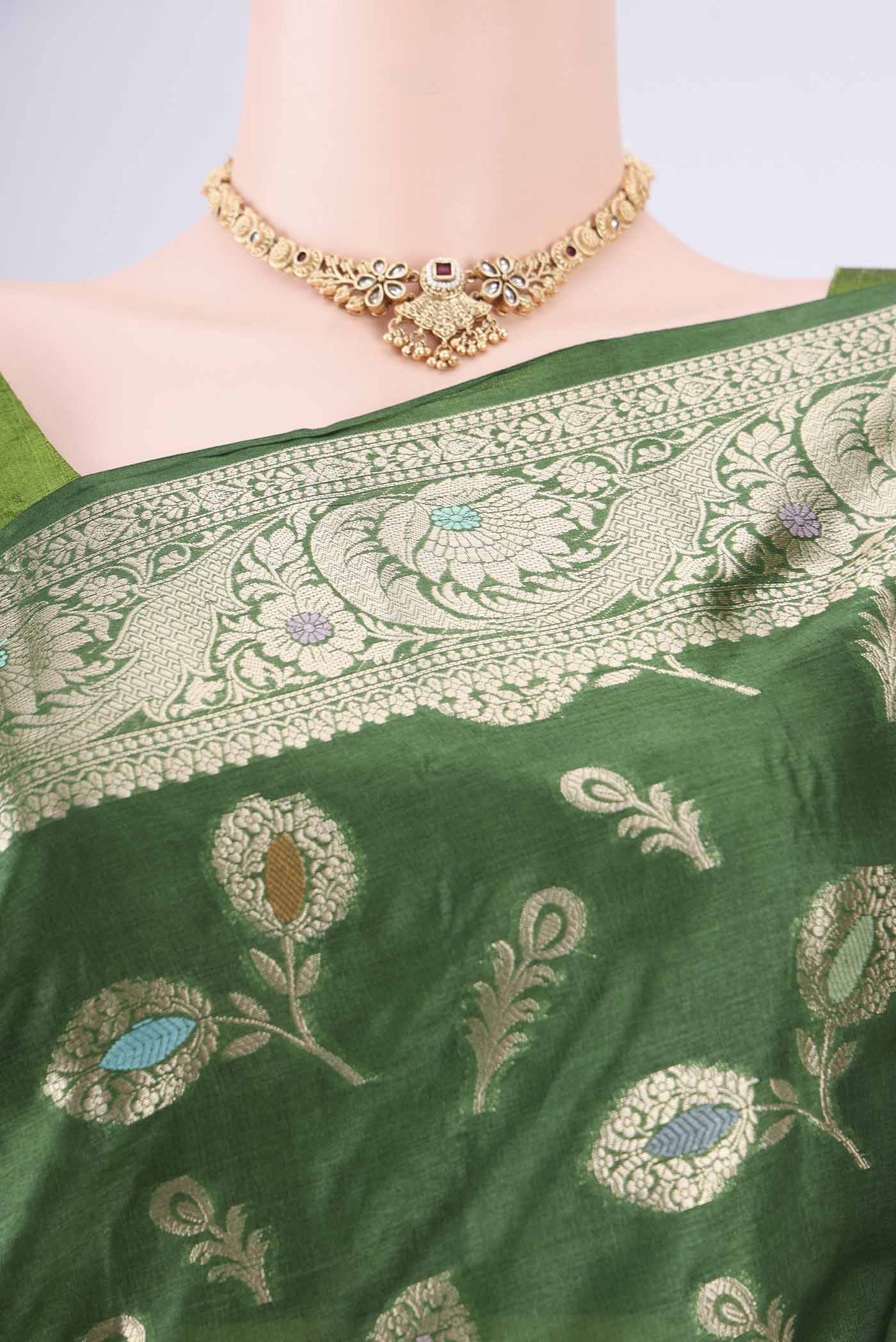 Border image of Green Banarasi Tussar Silk Saree with Zari And Thread Butta on the body and Zari Border. 
