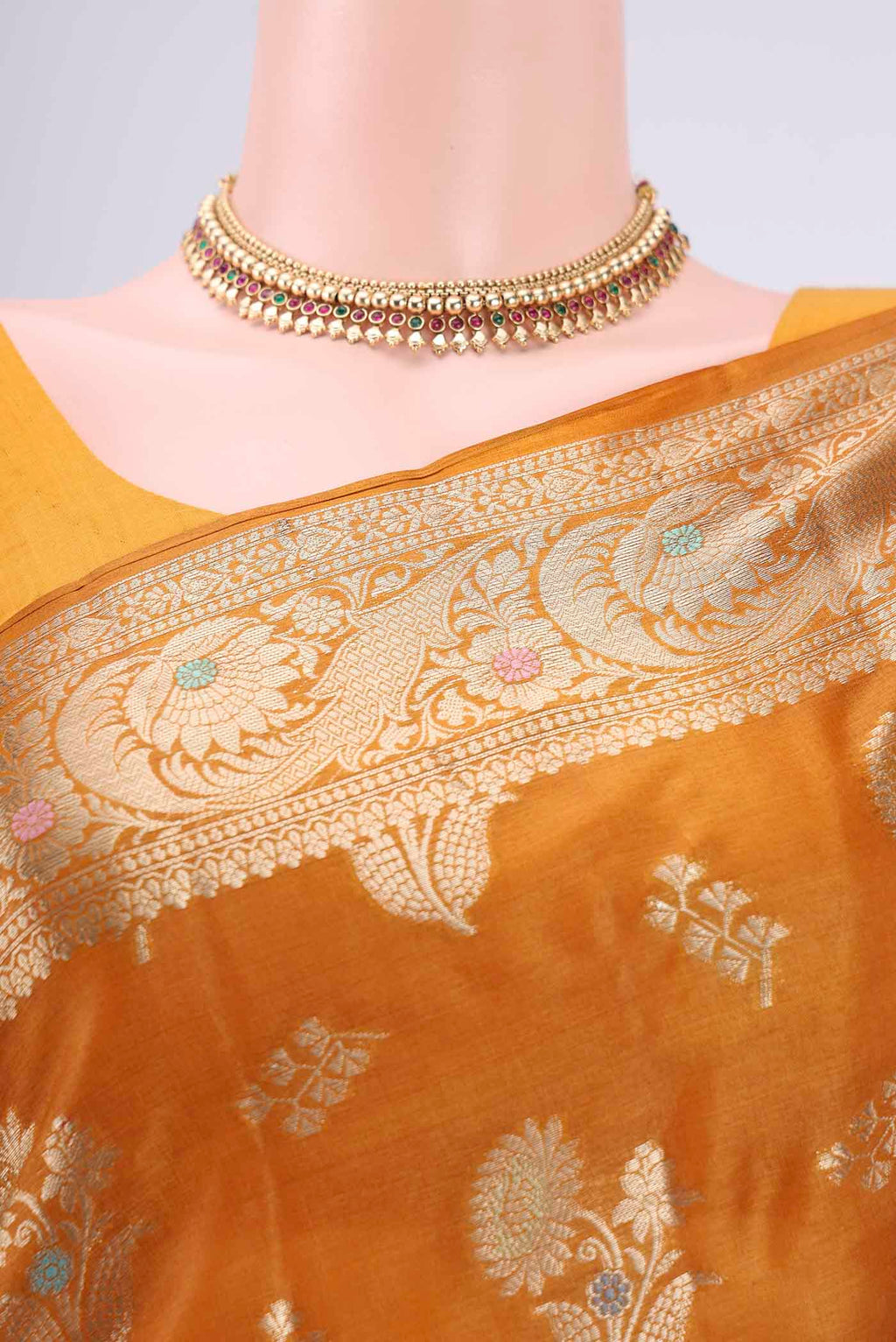 Border image of Mustard Banarasi Tussar Silk Saree with Zari Butta on the body and Zari Border. 