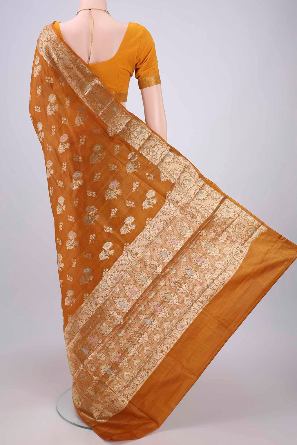 Flat view of Mustard Banarasi Tussar Silk Saree with Zari Butta on the body and Zari Border. 