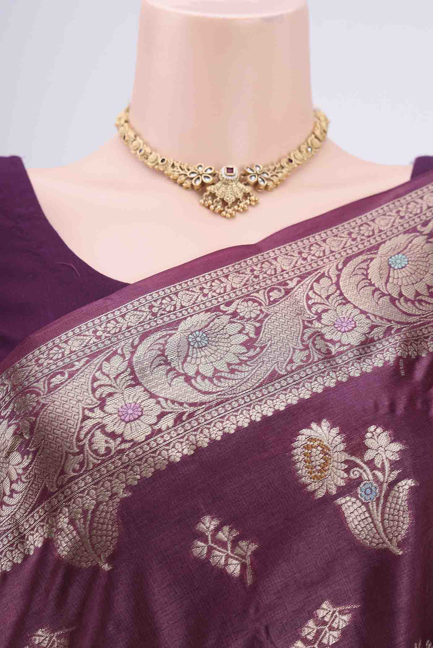 Border image of Burgundy Banarasi Tussar Silk Saree with Zari And Thread Butta on the body and Zari And Thread Border. 