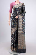 Davys Grey Banarasi Tussar Silk Saree with Zari Brocade on the body and Zari And Thread Border.  displayed on a mannequin