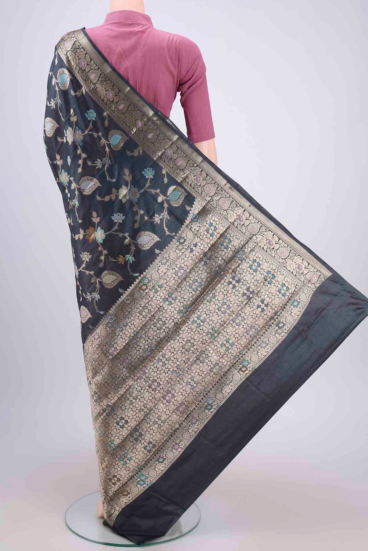 Flat view of Davys Grey Banarasi Tussar Silk Saree with Zari Brocade on the body and Zari And Thread Border. 
