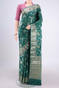 Sea Green Banarasi Tussar Silk Saree with Zari Brocade on the body and Zari And Thread Border.  displayed on a mannequin