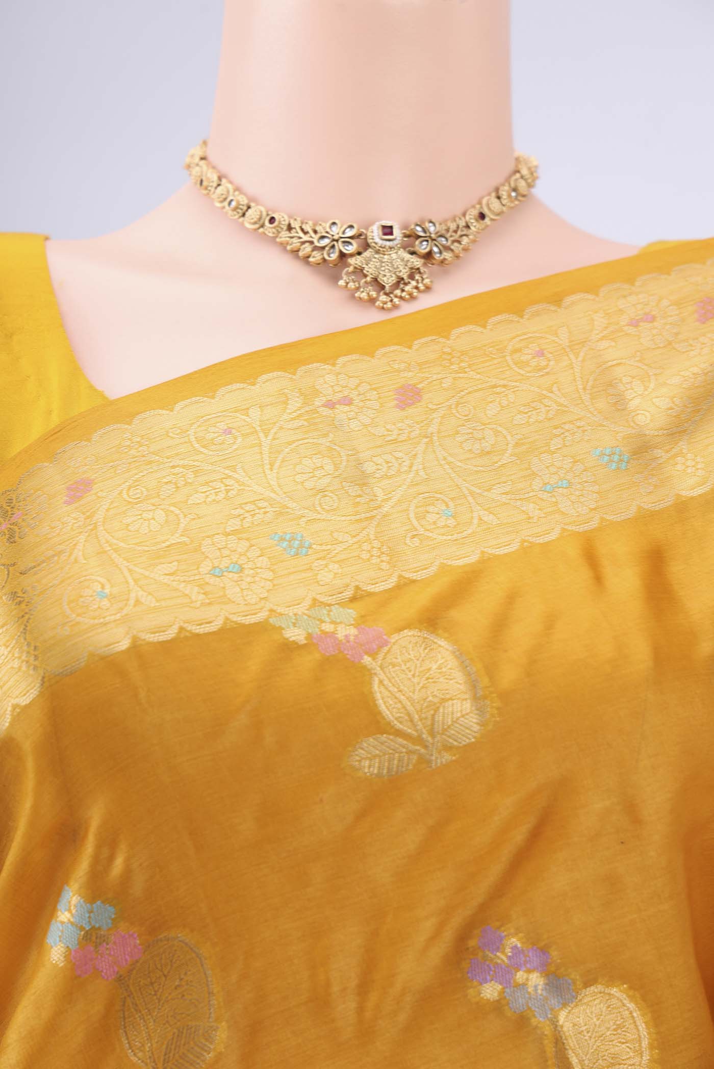 Border image of Mustard Banarasi Tussar Silk Saree with Zari And Thread Butta on the body and Zari And Thread Border. 