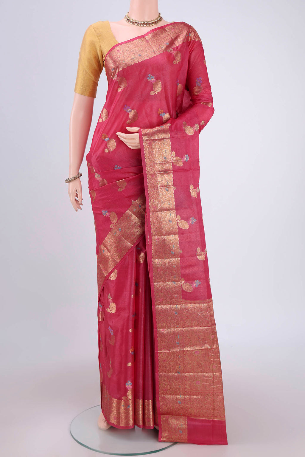 Pink Banarasi Raw Silk Saree with Zari And Thread Butta on the body and Zari And Thread Border.  displayed on a mannequin