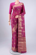 Magenta Banarasi Tussar Silk Saree with Zari And Thread Butta on the body and Zari And Thread Border.  displayed on a mannequin