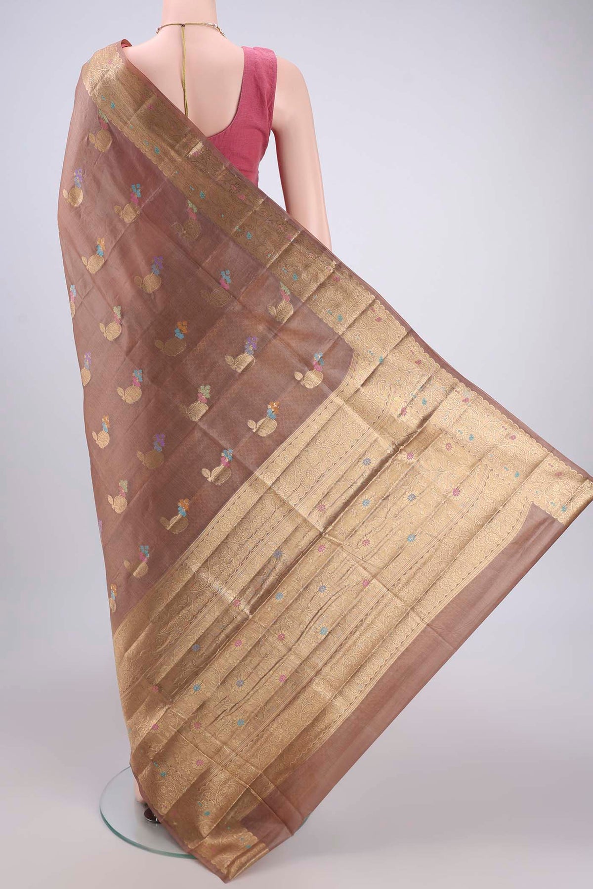 Flat view of Brown Banarasi Tussar Silk Saree with Zari Brocade on the body and Zari Border. 
