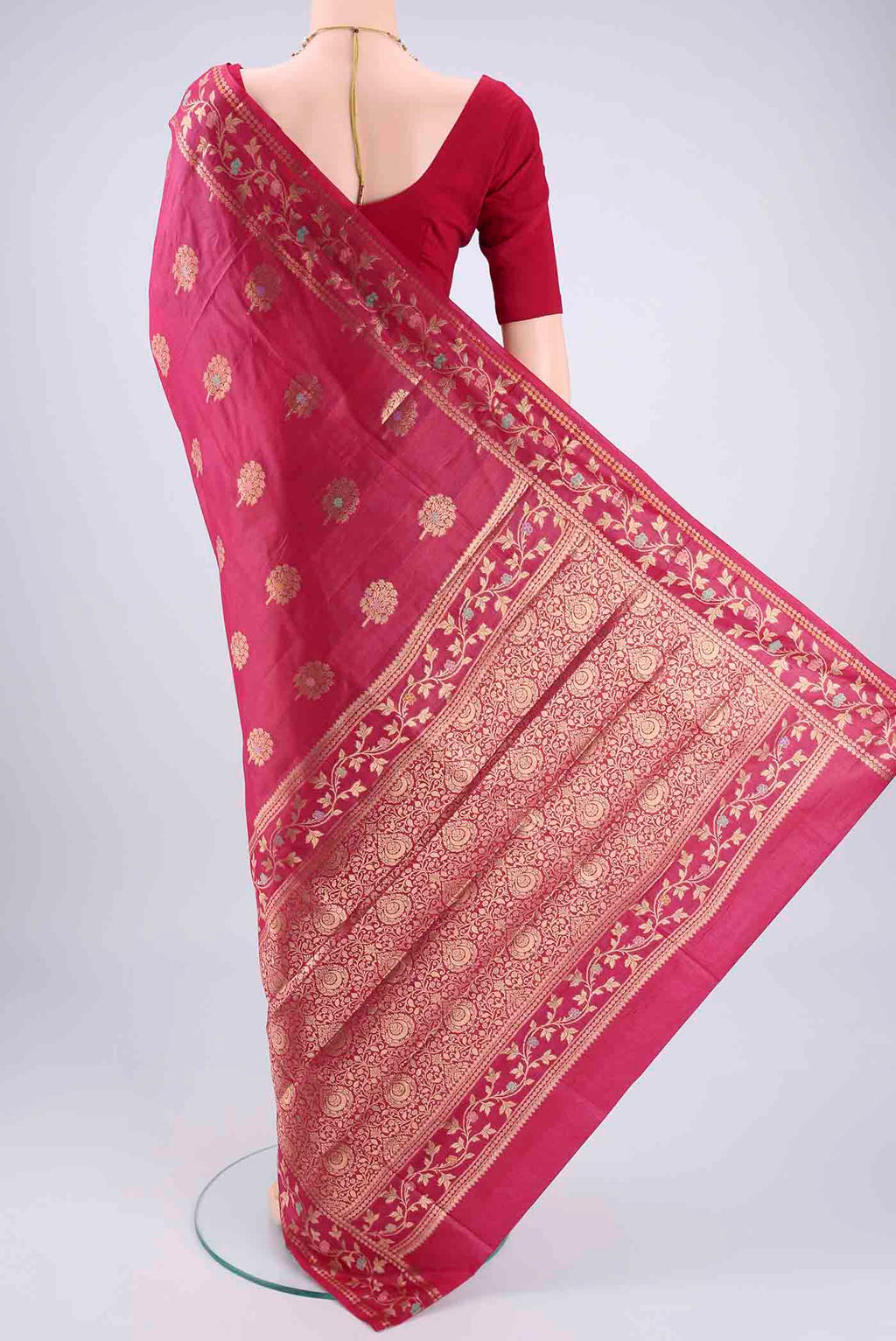 Flat view of Rani Pink Banarasi Tussar Silk Saree with Zari And Thread Butta on the body and Zari And Thread Border. 