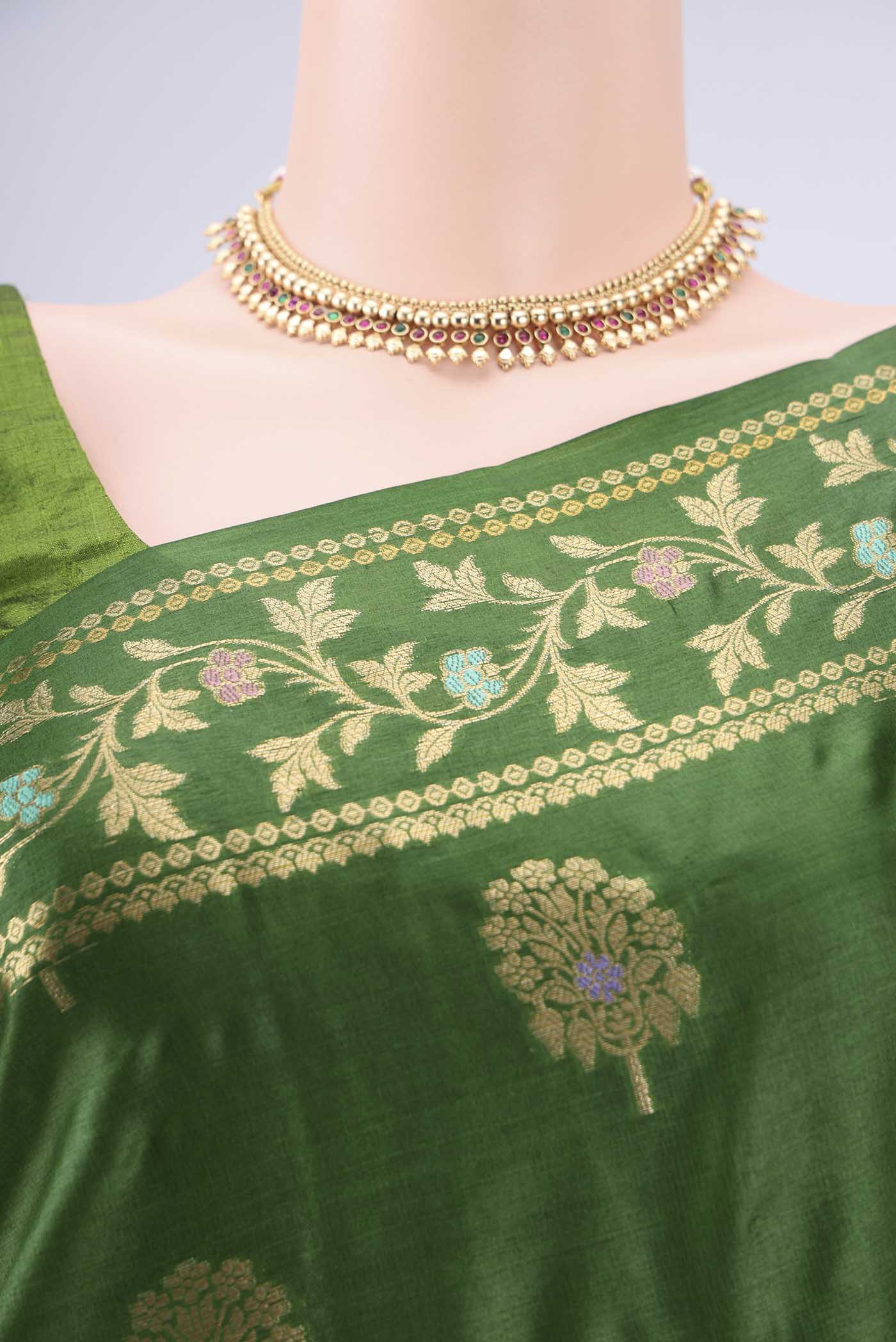Border image of Green Banarasi Tussar Silk Saree with Zari And Thread Butta on the body and Zari And Thread Border. 