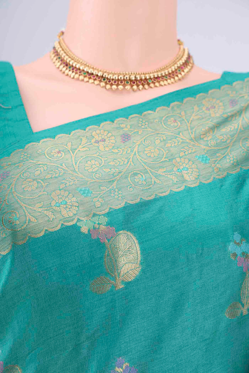Border image of Turquoise Banarasi Tussar Silk Saree with Zari And Thread Butta on the body and Zari And Thread Border. 