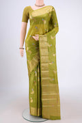 Light Green Banarasi Tussar Silk Saree with Zari And Thread Butta on the body and Zari And Thread Border.  displayed on a mannequin