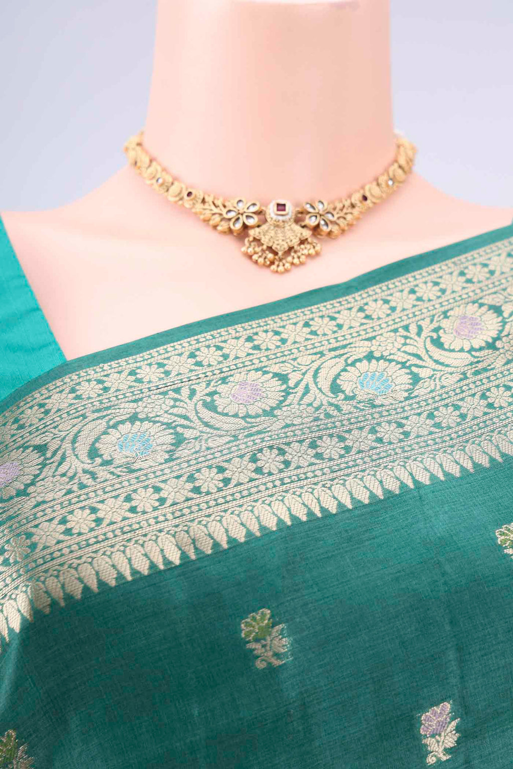 Border image of Green Banarasi Tussar Silk Saree with Zari Butta on the body and Zari And Thread Border. 