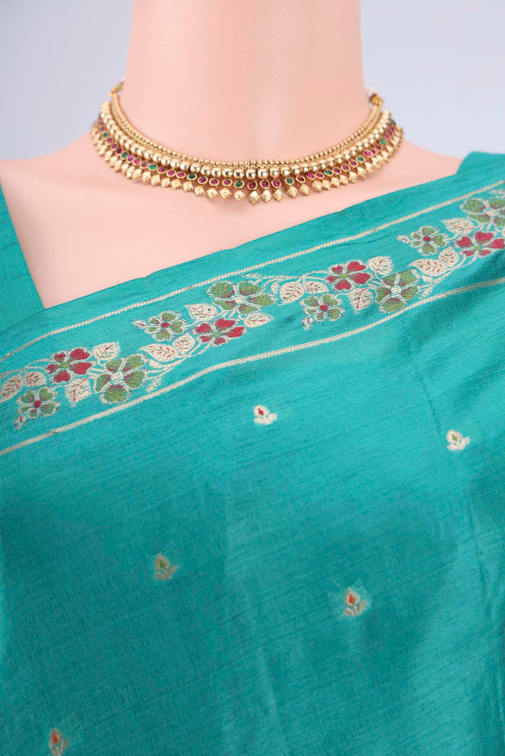 Border image of Turquoise Banarasi Tussar Silk Saree with Zari And Thread Butta on the body and Zari And Thread Border. 