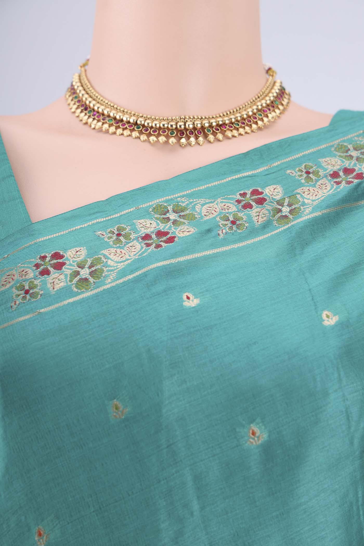 Border image of Turquoise Banarasi Tussar Silk Saree with Zari And Thread Butta on the body and Zari And Thread Border. 