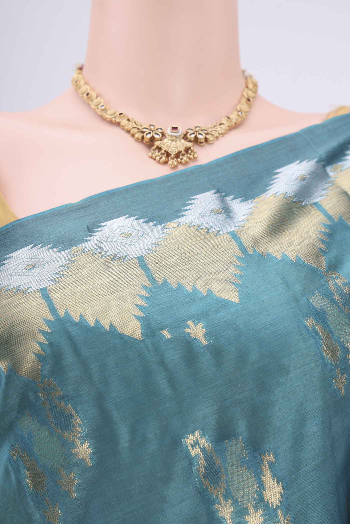 Border image of Blue Banarasi Tussar Silk Saree with Zari Butta on the body and Zari Border. 