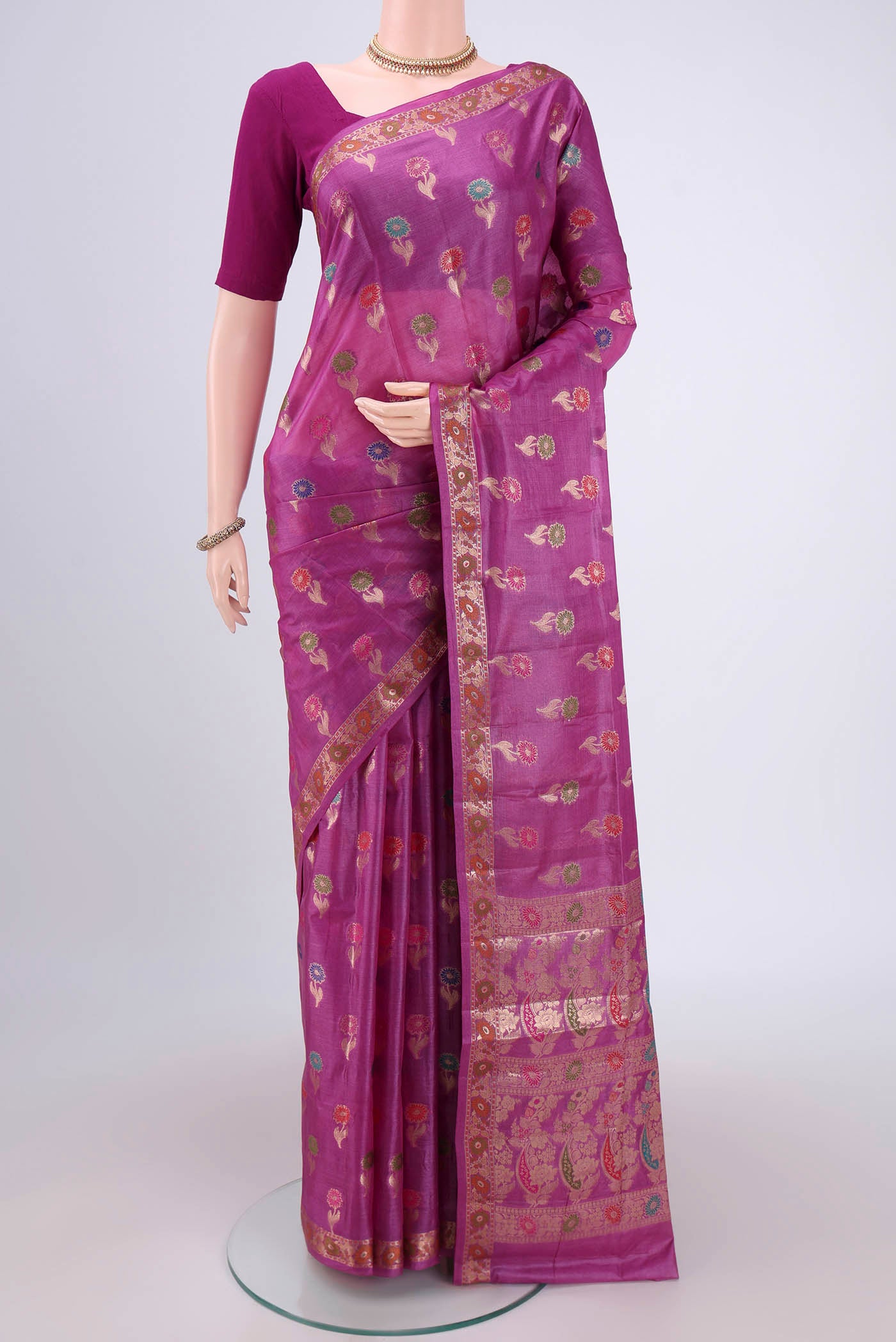 Light Magenta Banarasi Raw Silk Saree with Zari And Thread Butta on the body and Zari And Thread Border.  displayed on a mannequin