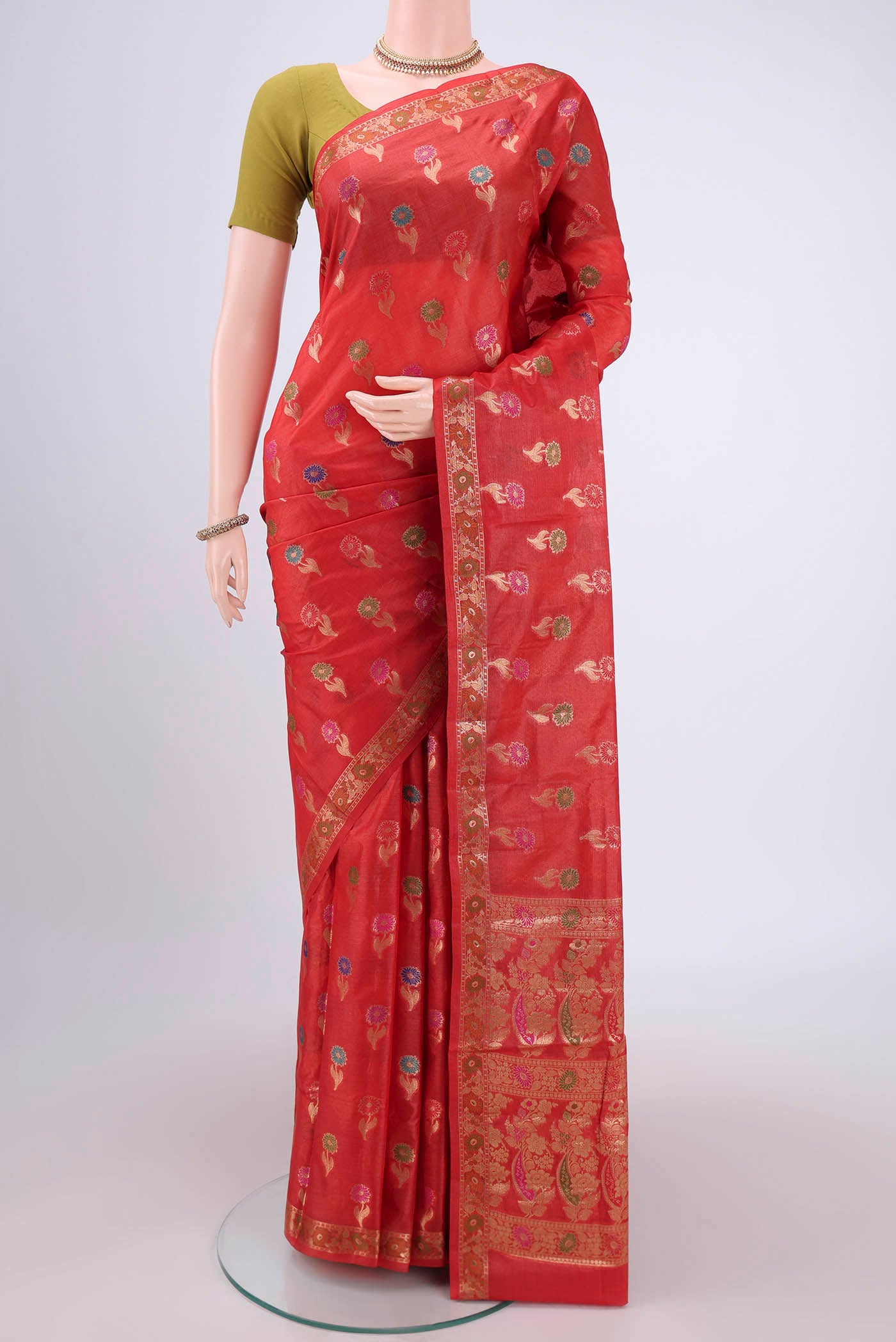 Red Banarasi Tussar Silk Saree with Zari And Thread Butta on the body and Zari And Thread Border.  displayed on a mannequin