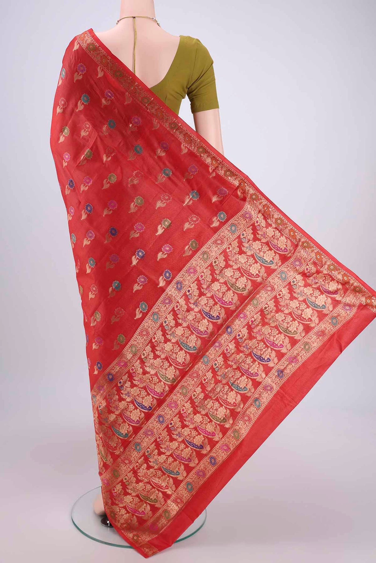 Flat view of Red Banarasi Tussar Silk Saree with Zari And Thread Butta on the body and Zari And Thread Border. 