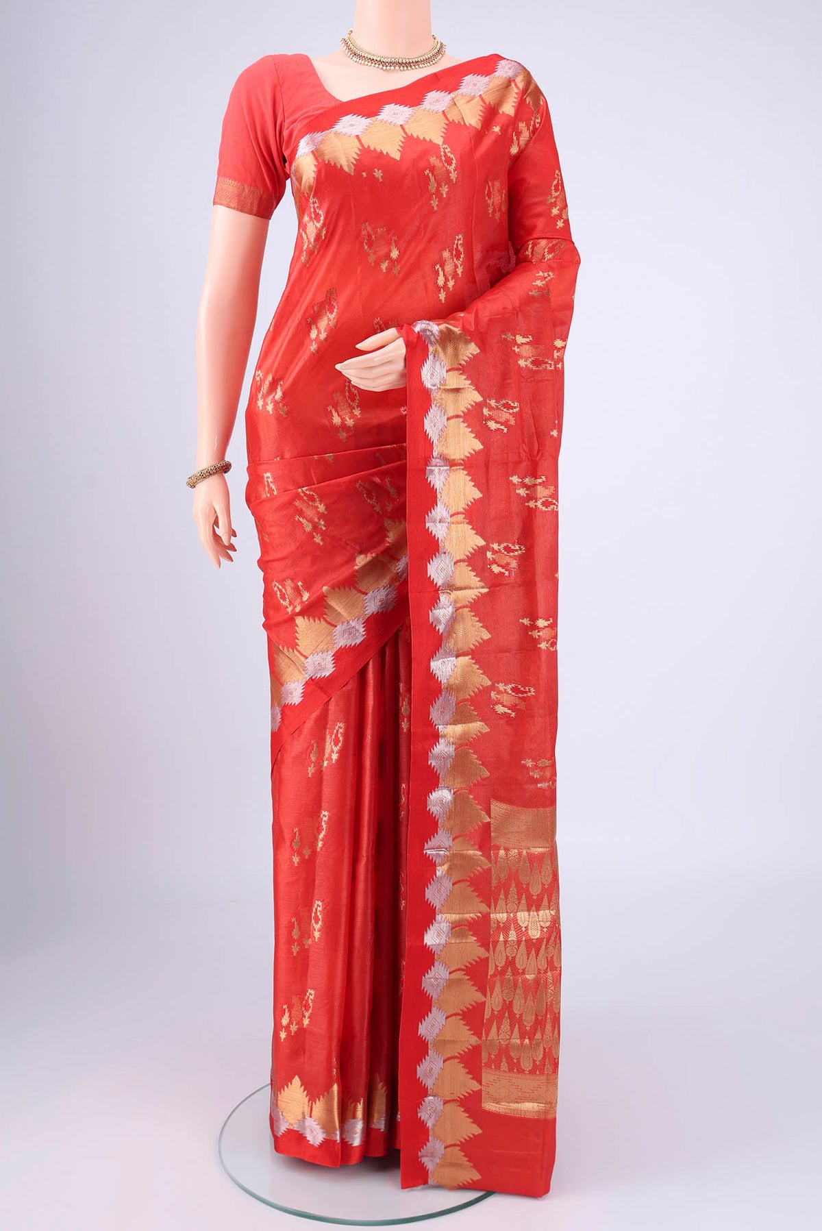 Imperial Red Banarasi Tussar Silk Saree with Zari Butta on the body and Zari Border.  displayed on a mannequin