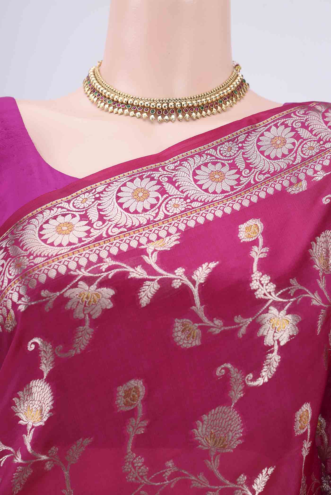 Border image of Rani Pink Banarasi Raw Silk Saree with Zari Brocade on the body and Zari Border. 