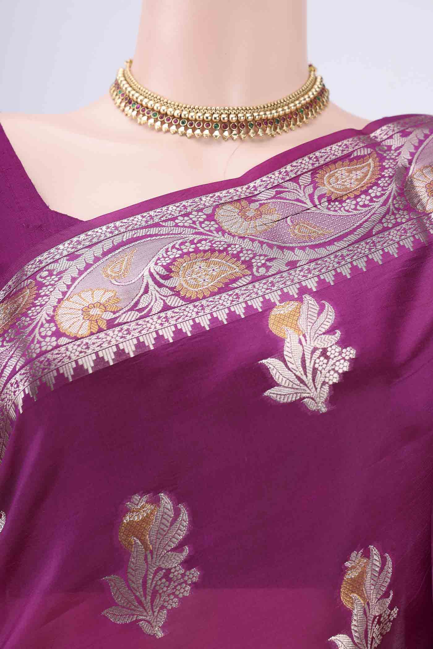 Border image of Magenta Banarasi Raw Silk Saree with Zari Butta on the body and Zari Border. 