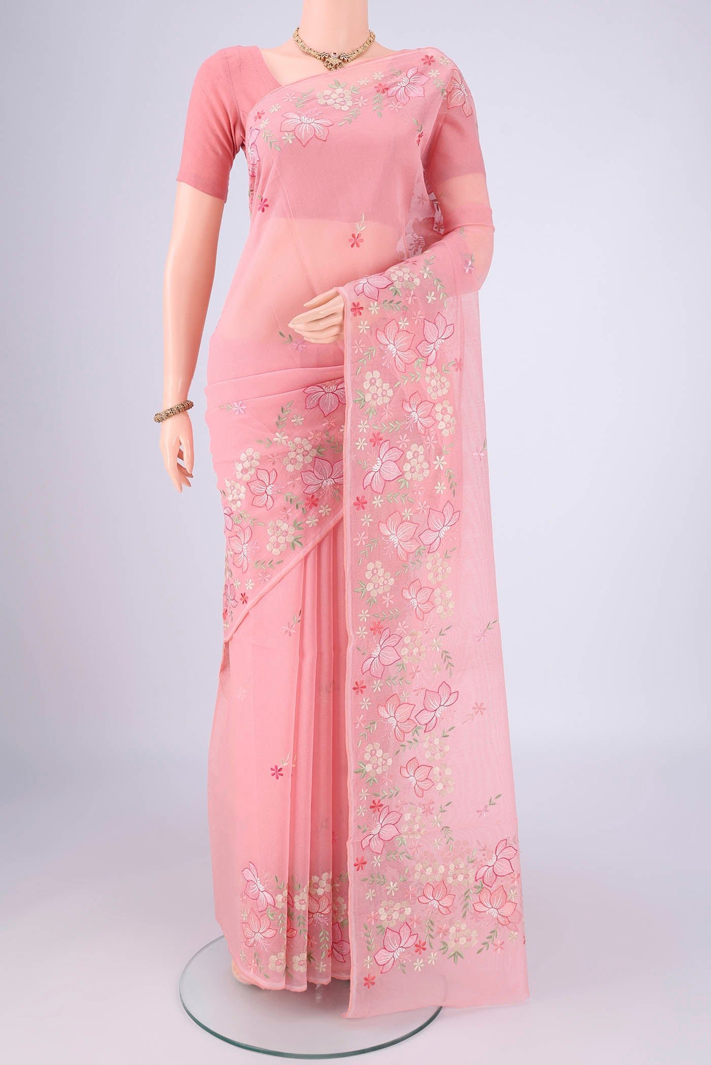 Rose pink Blended Kota Cotton Saree with Embroidery on the body and Thread Border.  displayed on a mannequin