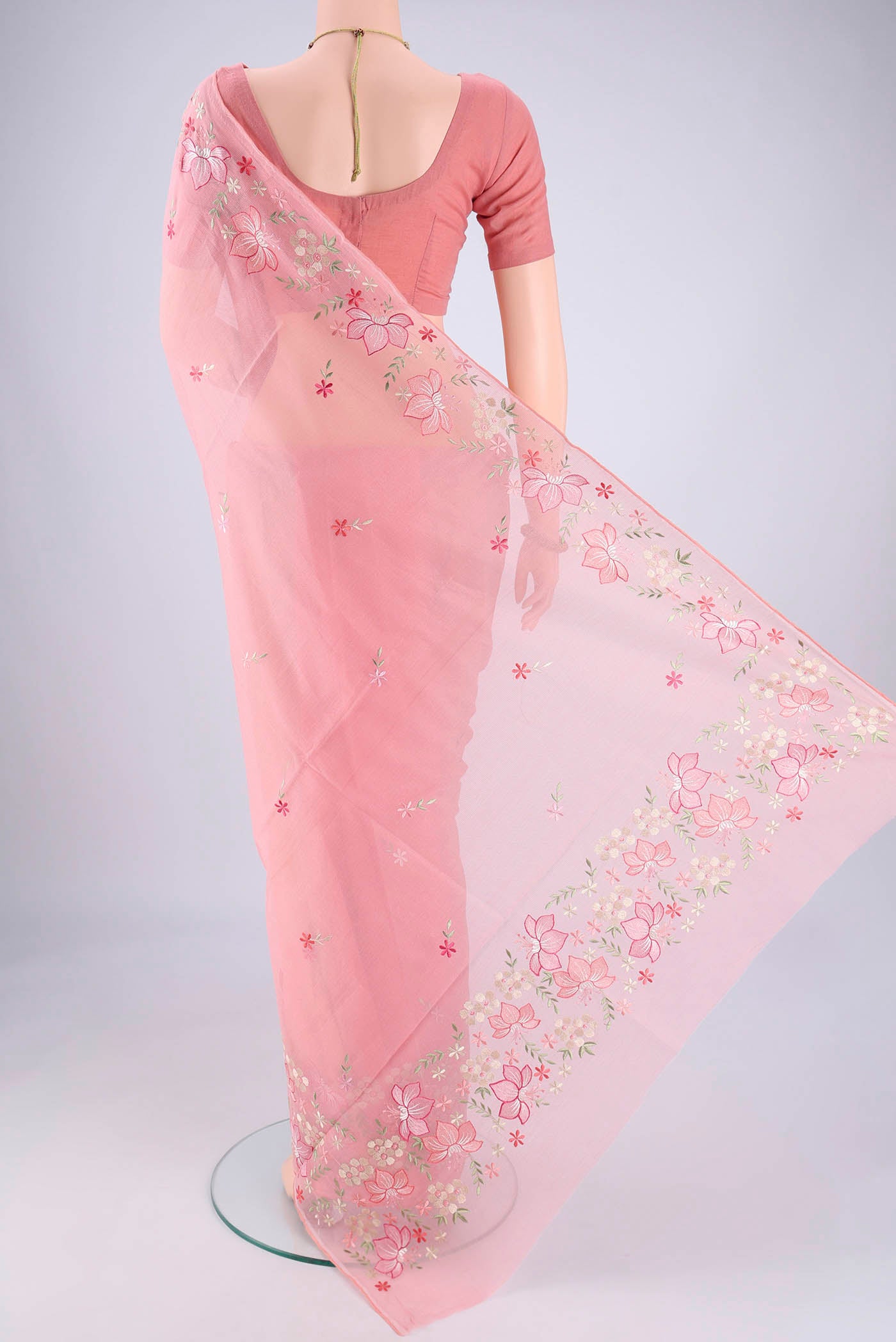 Flat view of Rose pink Blended Kota Cotton Saree with Embroidery on the body and Thread Border. 
