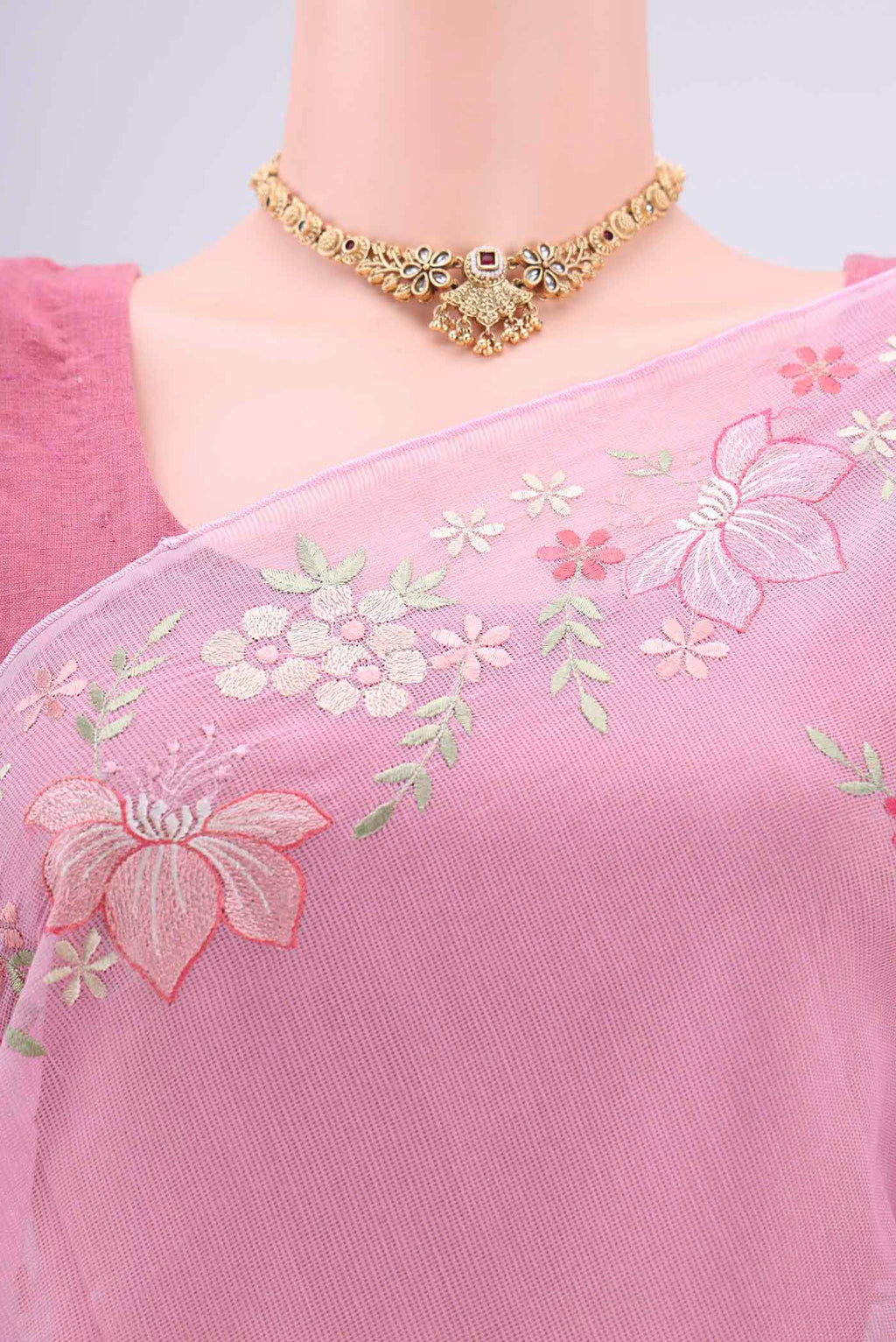 Border image of Rose pink Blended Kota Cotton Saree with Embroidery on the body and Embroidery Border. 