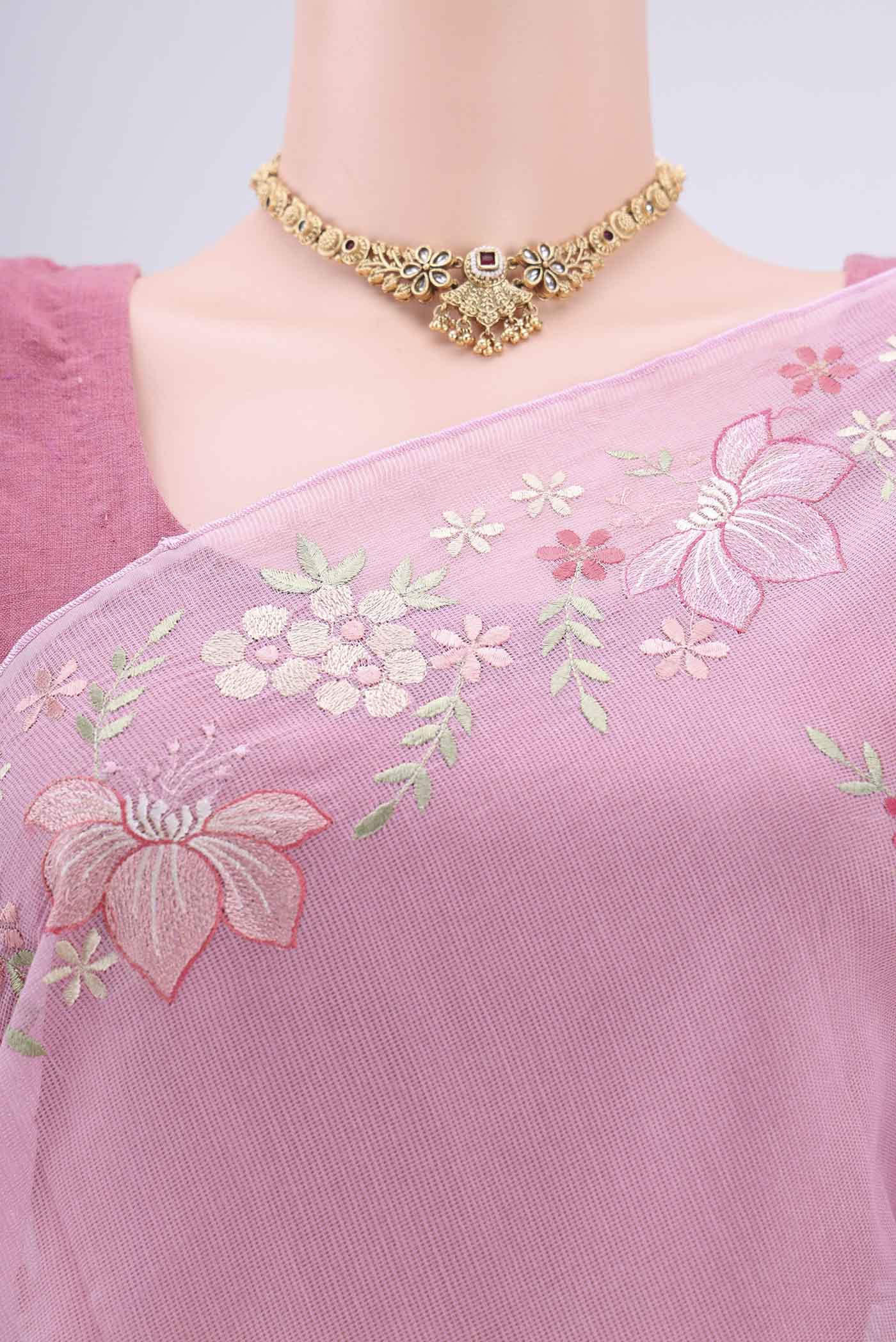 Border image of Rose pink Blended Kota Cotton Saree with Embroidery on the body and Embroidery Border. 