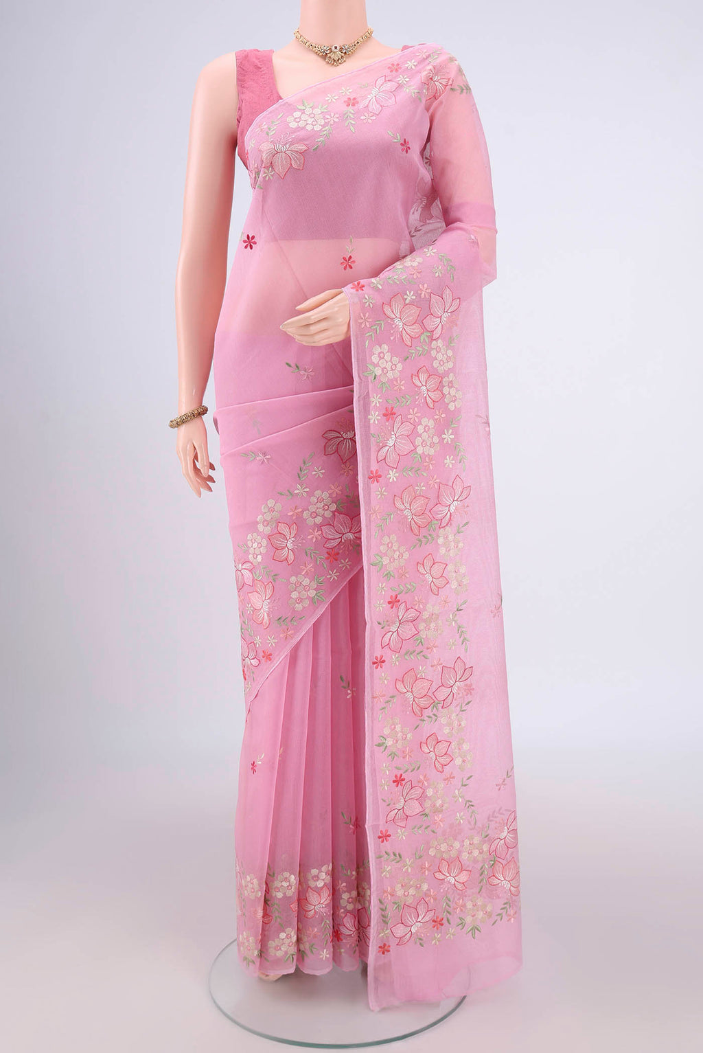 Rose pink Blended Kota Cotton Saree with Embroidery on the body and Embroidery Border.  displayed on a mannequin