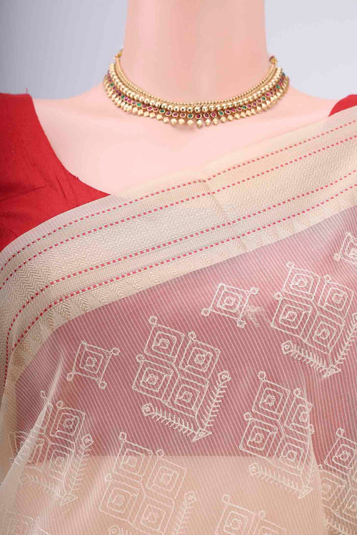 Border image of Beige Blended Kota Cotton Saree with Embroidery on the body and Thread Border. 