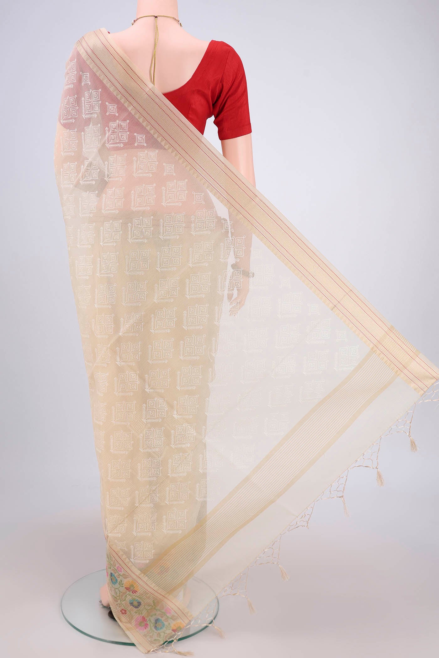 Flat view of Beige Blended Kota Cotton Saree with Embroidery on the body and Thread Border. 