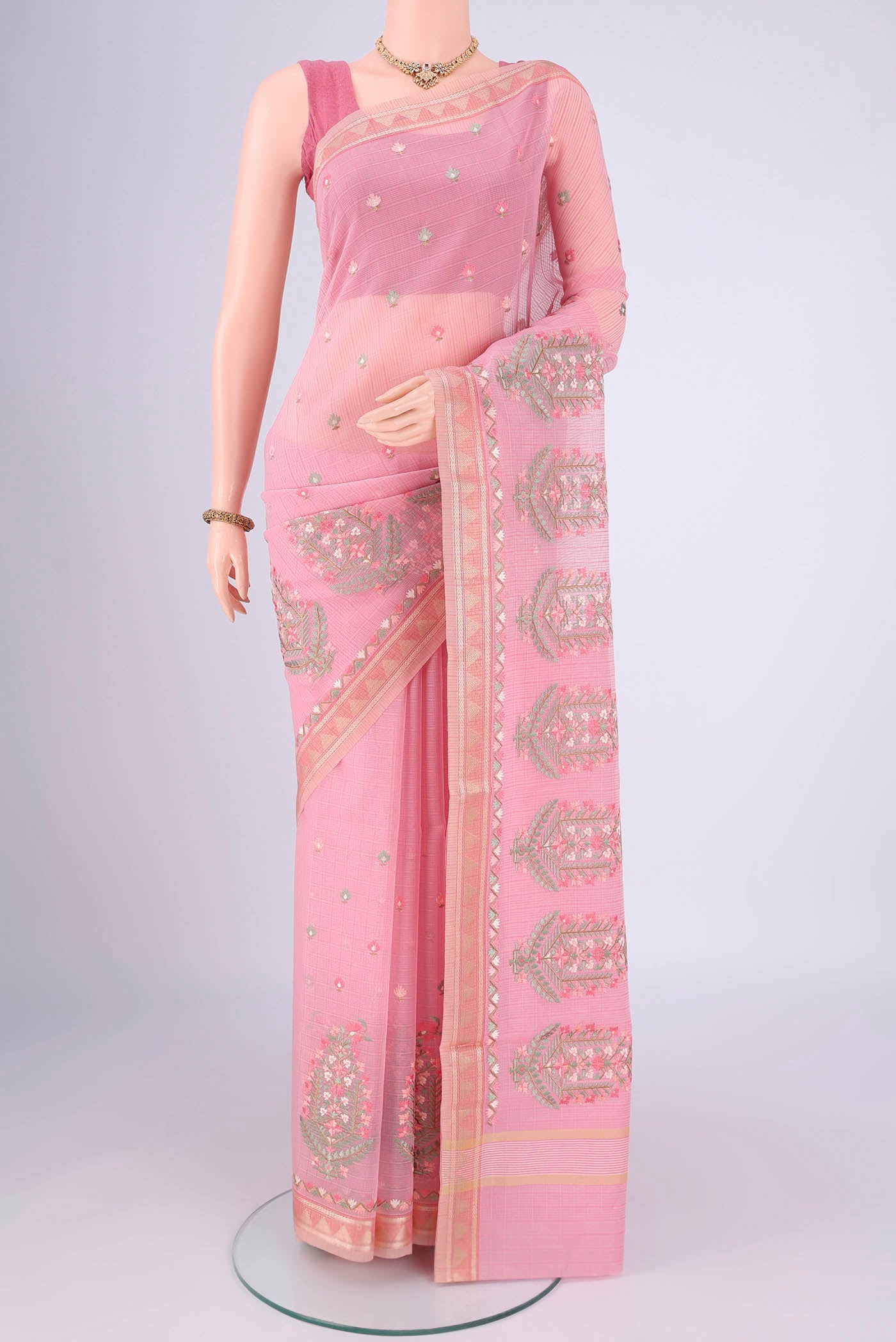 Rose pink Blended Kota Cotton Saree with Embroidery on the body and Thread Border.  displayed on a mannequin