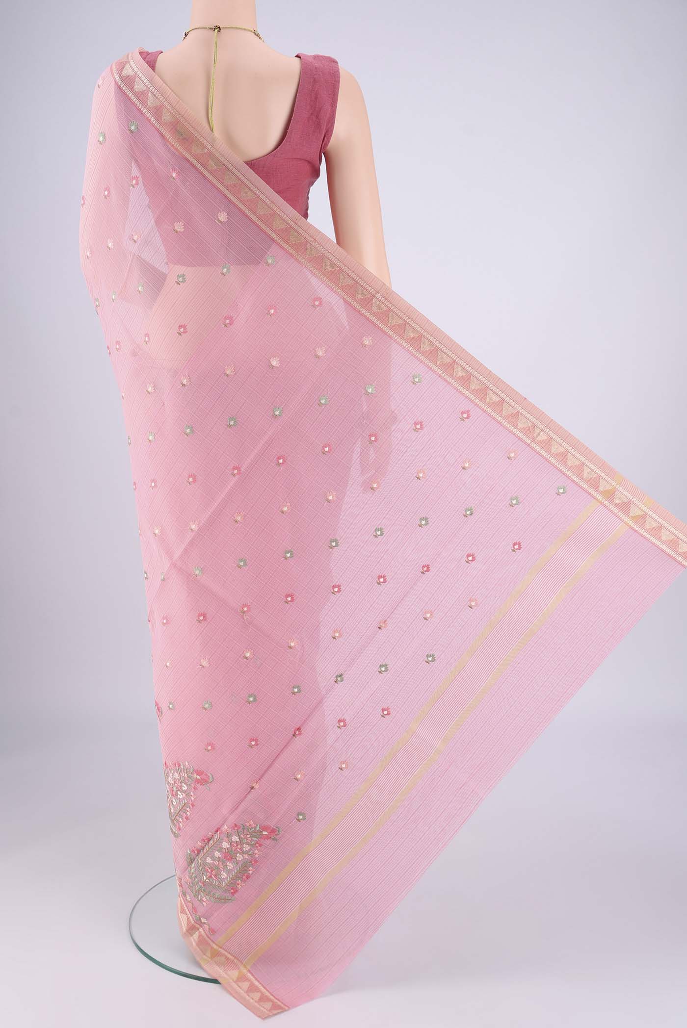 Flat view of Rose pink Blended Kota Cotton Saree with Embroidery on the body and Thread Border. 