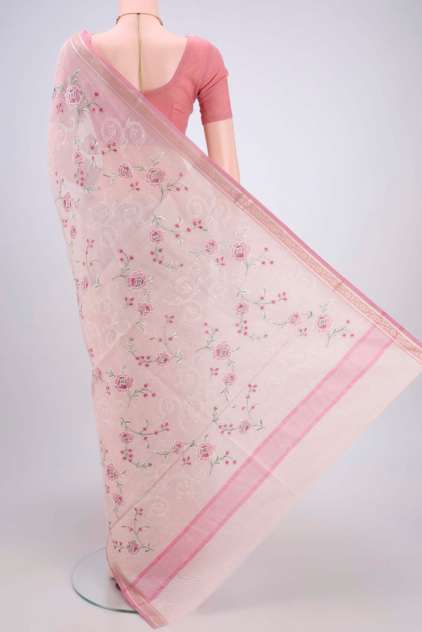 Flat view of Rose pink Blended Kota Cotton Saree with Embroidery on the body and Zari Border. 