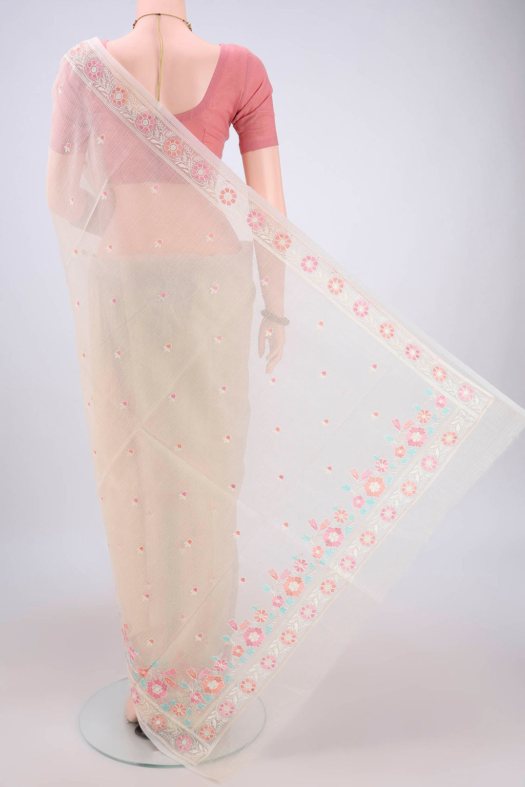 Flat view of Off White Blended Kota Cotton Saree with Thread Butta on the body and Embroidery Border. 