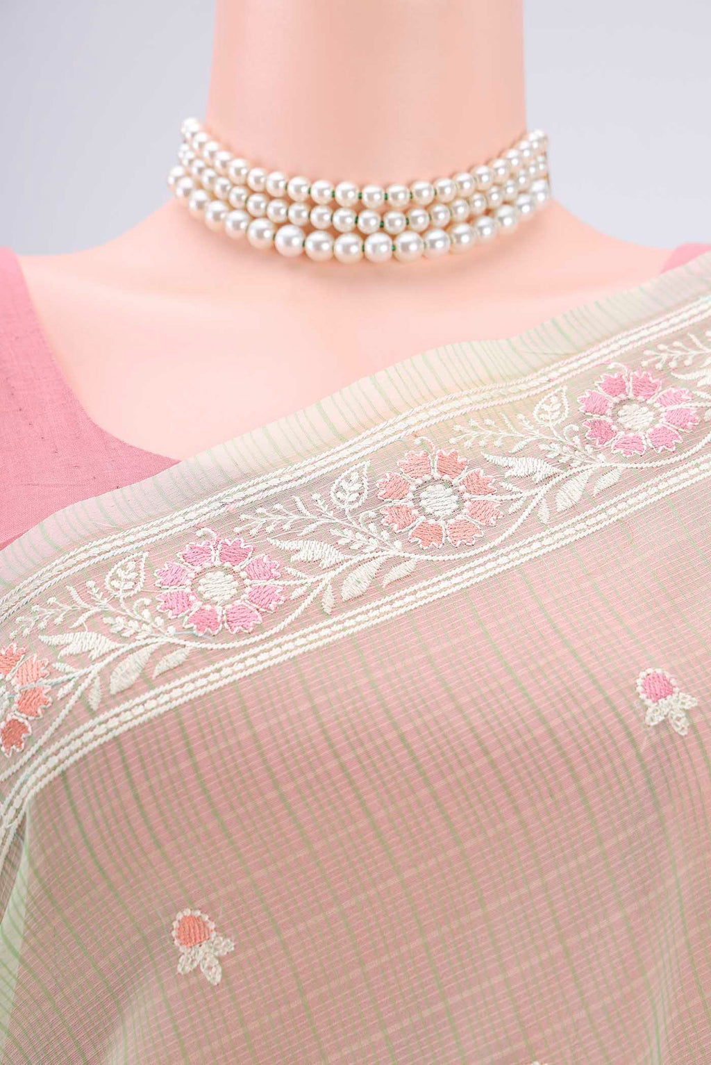 Border image of Light Green Blended Kota Cotton Saree with Thread Butta on the body and Embroidery Border. 