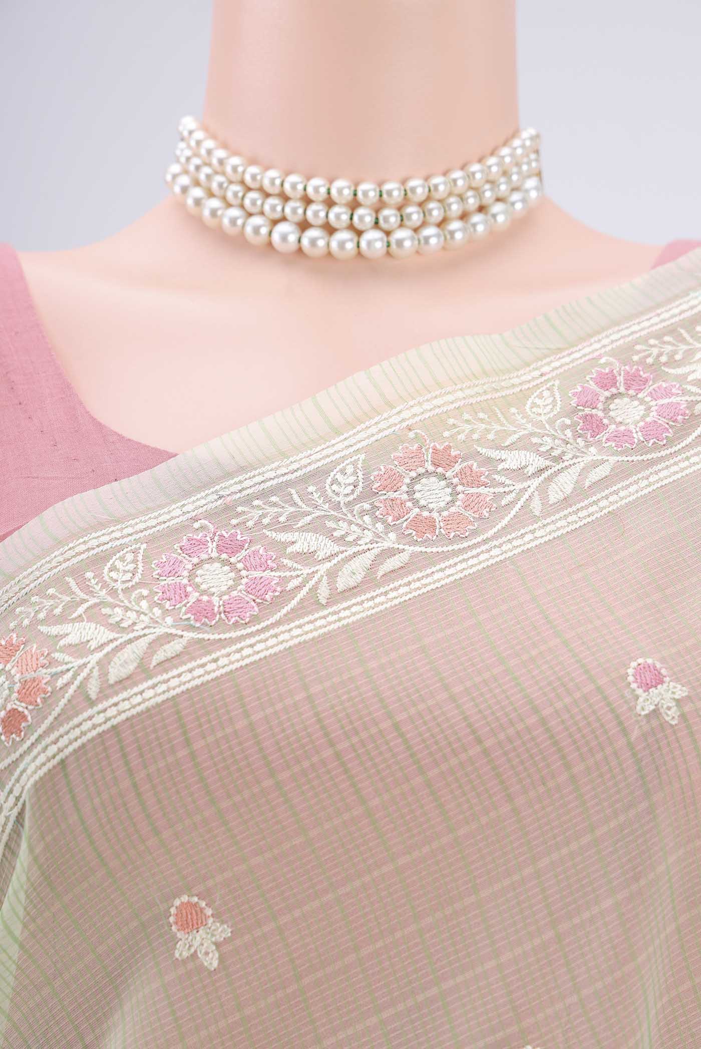 Border image of Light Green Blended Kota Cotton Saree with Thread Butta on the body and Embroidery Border. 