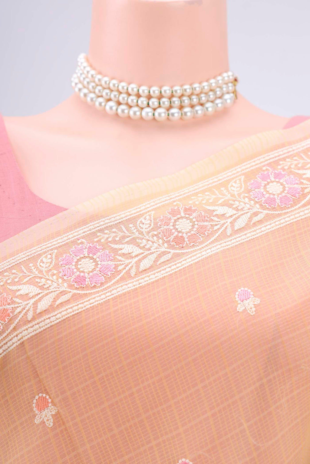 Border image of Yellow Blended Kota Cotton Saree with Embroidery on the body and Embroidery Border. 