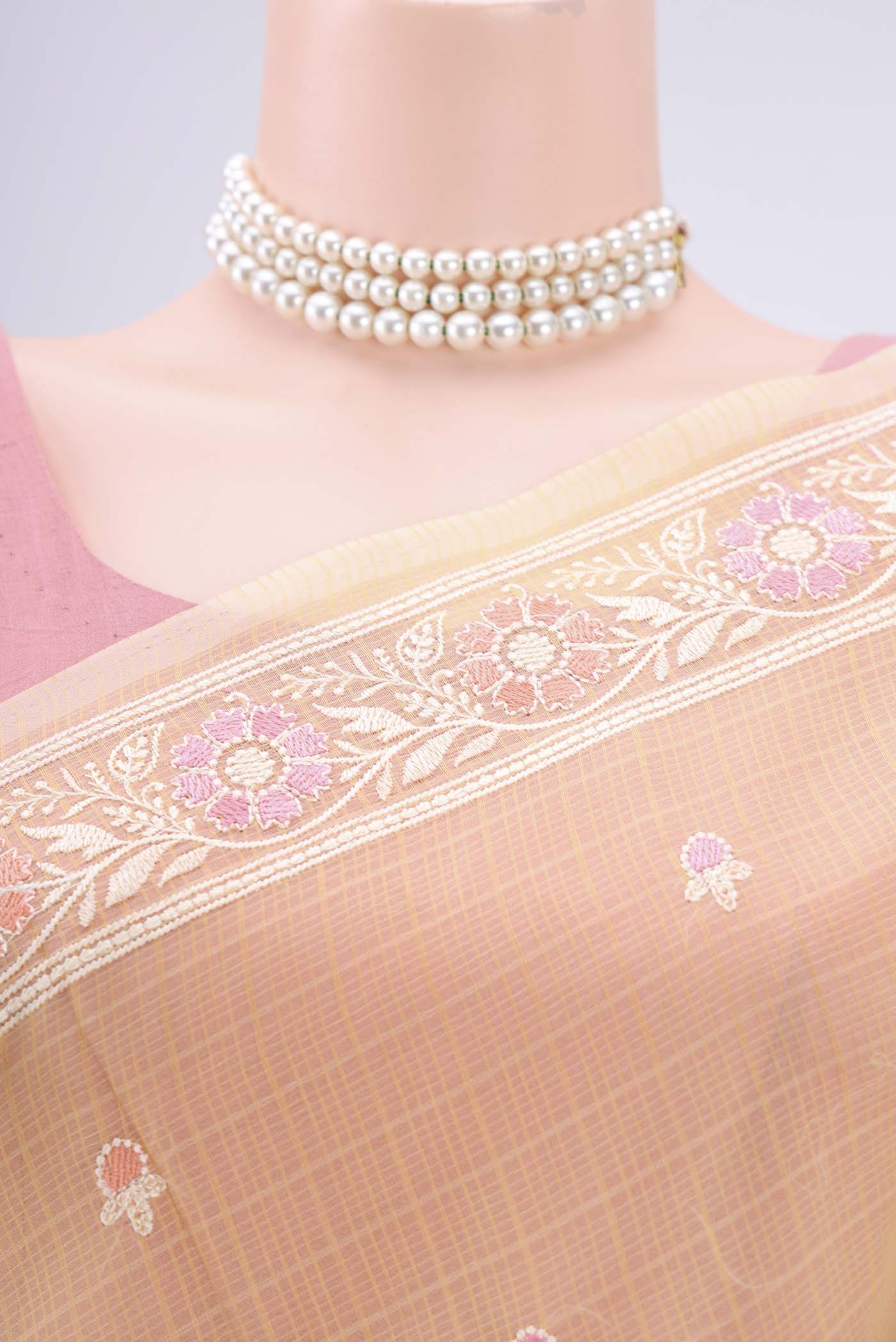 Border image of Yellow Blended Kota Cotton Saree with Embroidery on the body and Embroidery Border. 