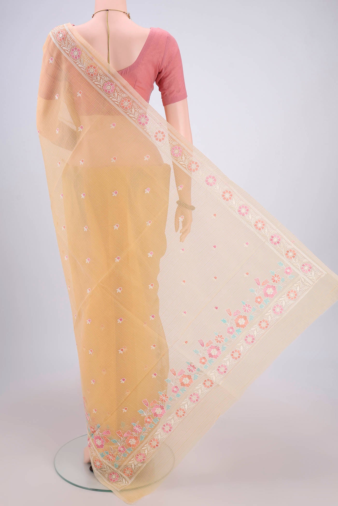 Flat view of Yellow Blended Kota Cotton Saree with Embroidery on the body and Embroidery Border. 
