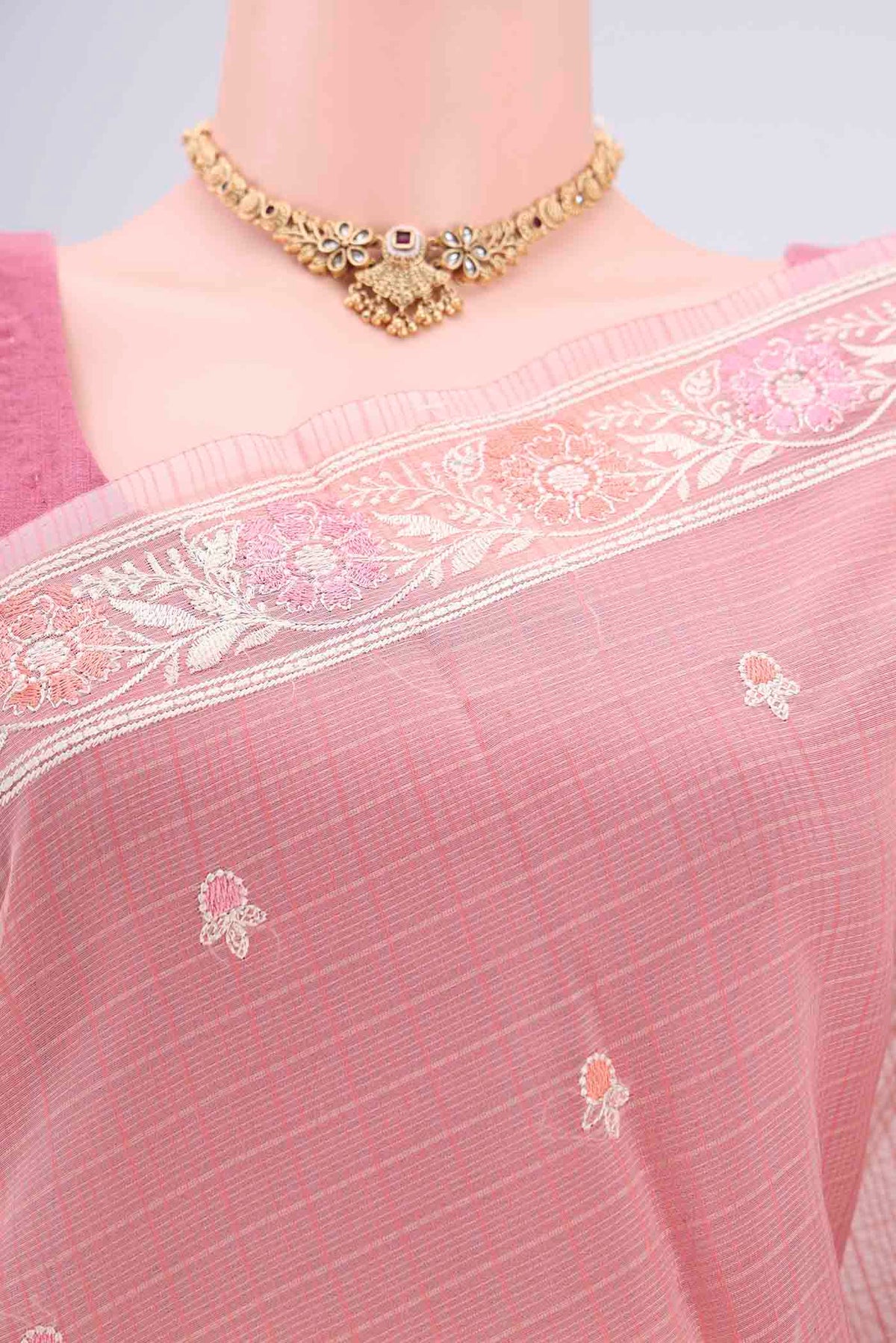 Border image of Peach Blended Kota Cotton Saree with Embroidery on the body and Embroidery Border. 