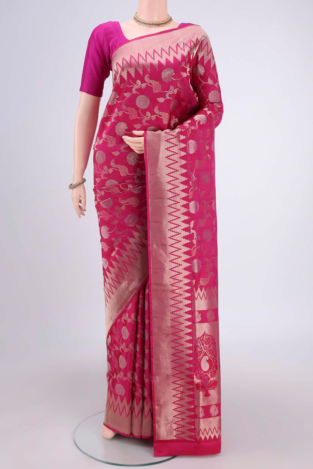 Orange with Pink Dual Tone Soft Silk Saree with Zari Brocade on the body and Zari Border.  displayed on a mannequin